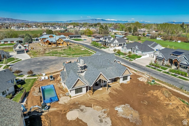 aerial view with a residential view and a mountain view