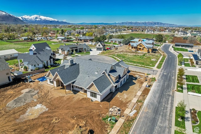 bird's eye view featuring a mountain view and a residential view