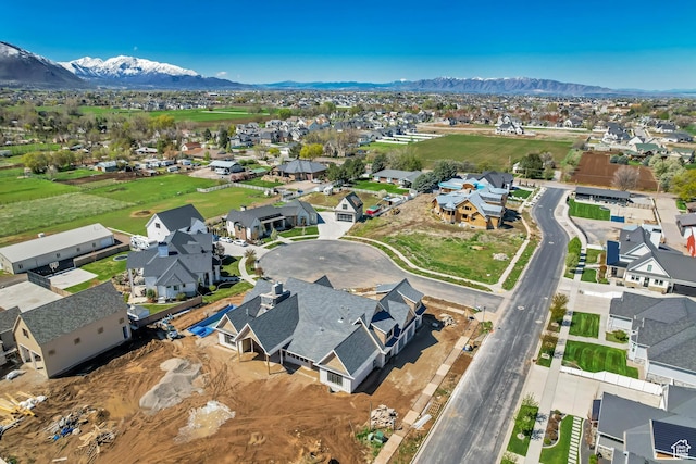 bird's eye view with a mountain view and a residential view