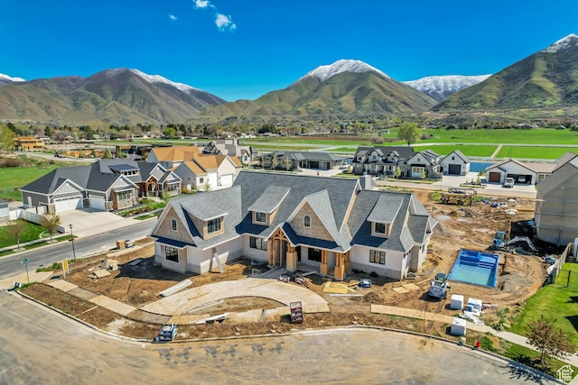 birds eye view of property featuring a residential view and a mountain view