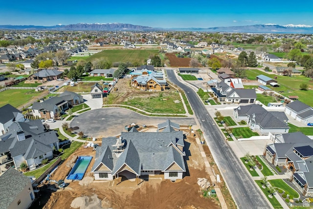 bird's eye view with a mountain view and a residential view