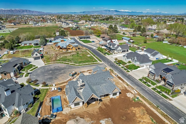 bird's eye view featuring a residential view and a mountain view