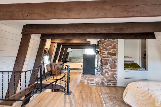 10481 E Spring Creek Dr Unit 722, Heber City, UT 84032 - interior space featuring beamed ceiling, wood walls, and light hardwood / wood-style flooring