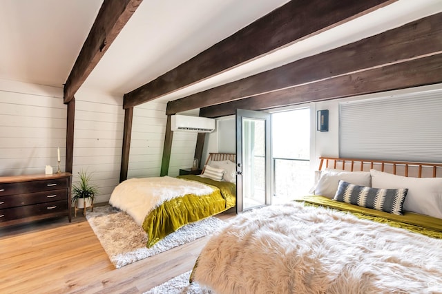 10481 E Spring Creek Dr Unit 722, Heber City, UT 84032 - bedroom featuring light hardwood / wood-style flooring, beamed ceiling, a wall unit AC, and wooden walls