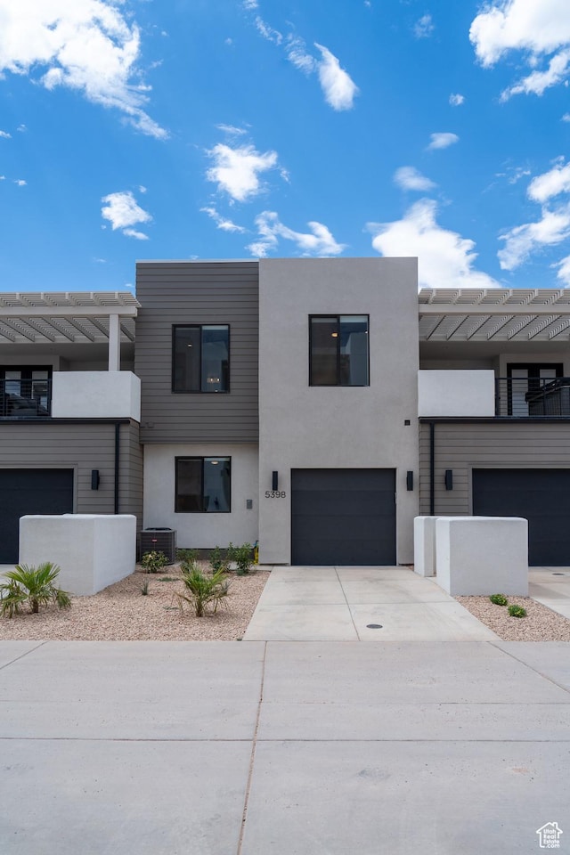 5398 S Aquamarine Ln, St George, UT 84790 - contemporary house featuring a garage and cooling unit