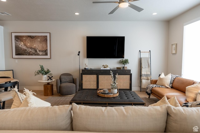 5398 S Aquamarine Ln, St George, UT 84790 - living room with ceiling fan, light hardwood / wood-style floors, and a healthy amount of sunlight