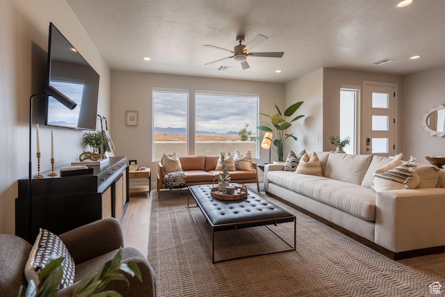 5398 S Aquamarine Ln, St George, UT 84790 - living room with a textured ceiling, dark wood-type flooring, and ceiling fan