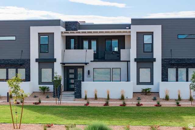 5398 S Aquamarine Ln, St George, UT 84790 - contemporary house featuring a front lawn and a balcony