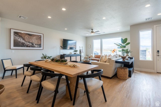 5398 S Aquamarine Ln, St George, UT 84790 - dining area with light hardwood / wood-style flooring, ceiling fan, and a textured ceiling