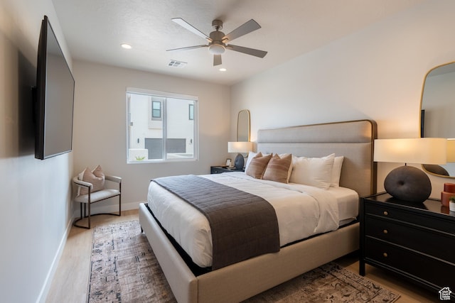 5398 S Aquamarine Ln, St George, UT 84790 - bedroom with hardwood / wood-style floors and ceiling fan