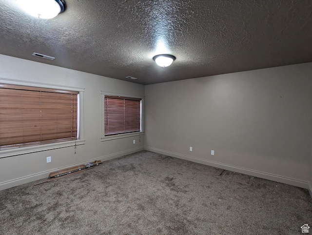 3006 E Somerset Dr, Spanish Fork, UT 84660 - spare room featuring carpet, visible vents, a textured ceiling, and baseboards