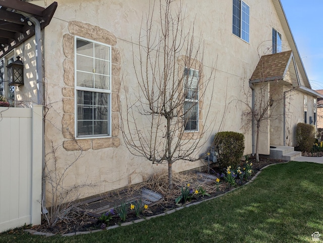 3006 E Somerset Dr, Spanish Fork, UT 84660 - view of side of property featuring stucco siding and a lawn