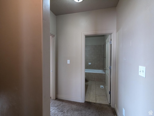 3006 E Somerset Dr, Spanish Fork, UT 84660 - hallway featuring baseboards, carpet, and a textured ceiling