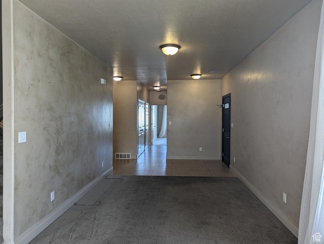 3006 E Somerset Dr, Spanish Fork, UT 84660 - hall with a textured ceiling, carpet flooring, tile patterned flooring, and visible vents