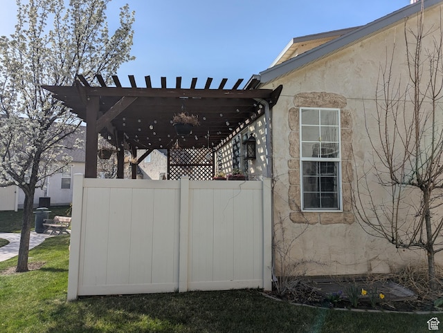 3006 E Somerset Dr, Spanish Fork, UT 84660 - view of property exterior with fence, stucco siding, and a pergola