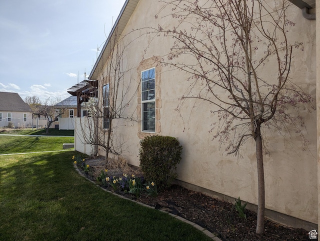 3006 E Somerset Dr, Spanish Fork, UT 84660 - view of side of home with a yard and stucco siding
