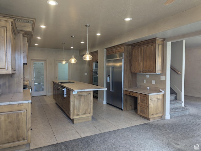 3006 E Somerset Dr, Spanish Fork, UT 84660 - kitchen featuring light carpet, built in appliances, recessed lighting, and an island with sink