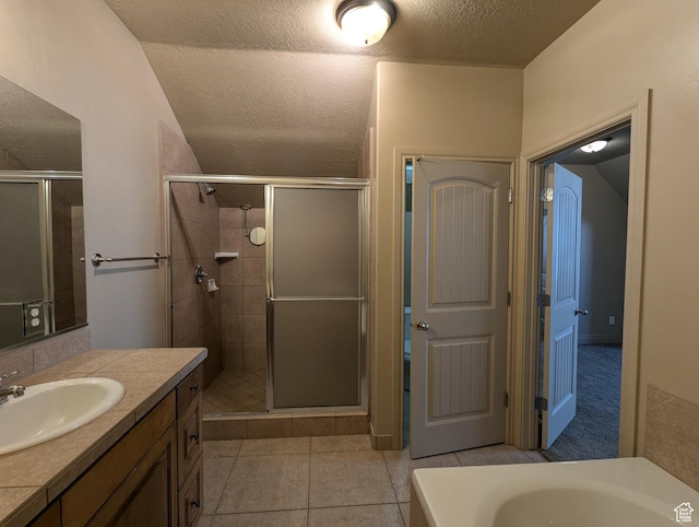 3006 E Somerset Dr, Spanish Fork, UT 84660 - bathroom featuring vanity, a stall shower, tile patterned flooring, and a textured ceiling