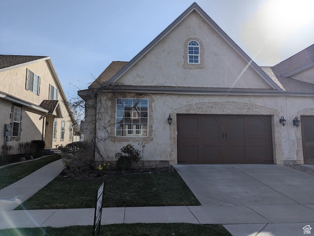 3006 E Somerset Dr, Spanish Fork, UT 84660 - view of front of home featuring driveway and stucco siding