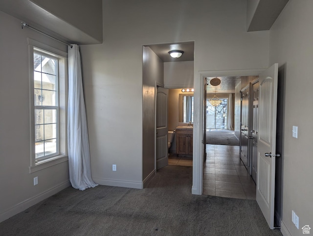 3006 E Somerset Dr, Spanish Fork, UT 84660 - hall with baseboards and carpet floors