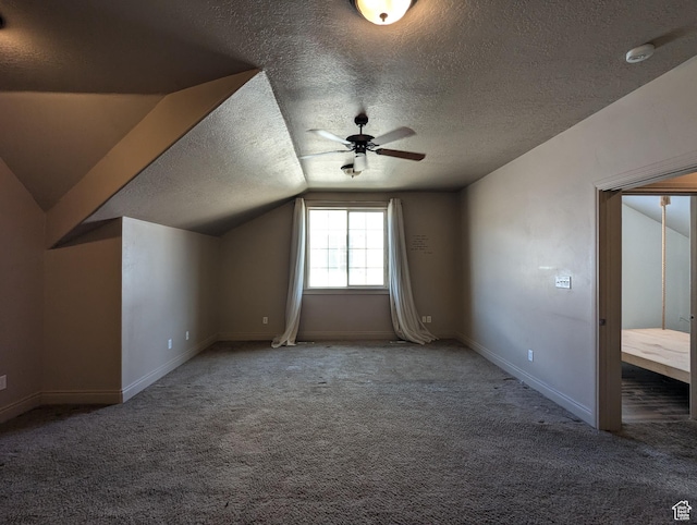 3006 E Somerset Dr, Spanish Fork, UT 84660 - bonus room featuring a textured ceiling, ceiling fan, vaulted ceiling, and carpet floors