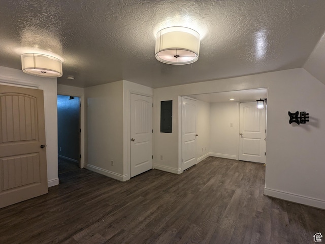 3006 E Somerset Dr, Spanish Fork, UT 84660 - interior space with electric panel, baseboards, a textured ceiling, and wood finished floors
