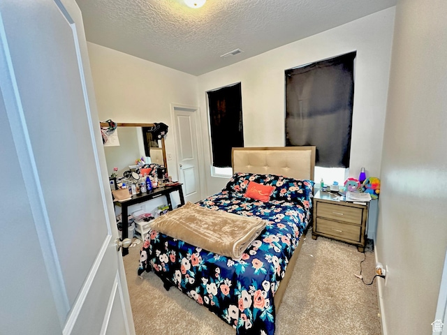 11587 S Prosperity Rd W, South Jordan, UT 84009 - bedroom featuring a textured ceiling and light carpet