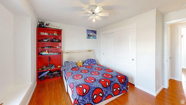 1125 N Trinnaman Ln, Lehi, UT 84043 - bedroom with ceiling fan, a closet, and hardwood / wood-style floors