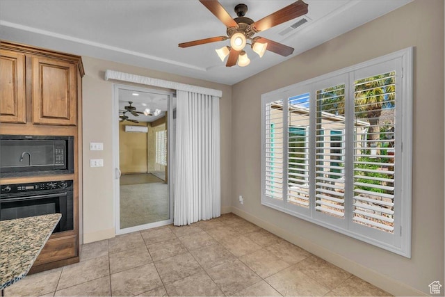 699 E Lost Dr, Washington, UT 84780 - unfurnished dining area with light tile patterned floors, visible vents, a ceiling fan, and baseboards