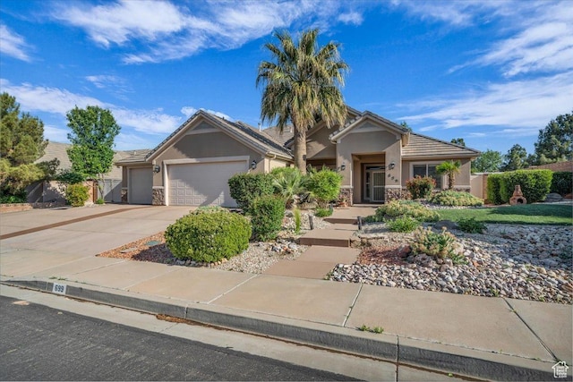 699 E Lost Dr, Washington, UT 84780 - single story home with stucco siding, driveway, a tiled roof, and an attached garage
