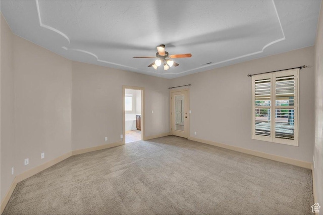699 E Lost Dr, Washington, UT 84780 - carpeted empty room with baseboards, a ceiling fan, and a wealth of natural light