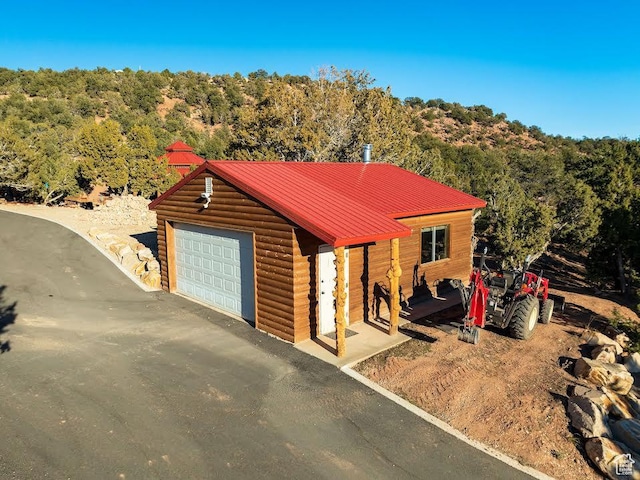 45450 W Cedar Rock Rd, Fruitland, UT 84027 - detached garage featuring a forest view