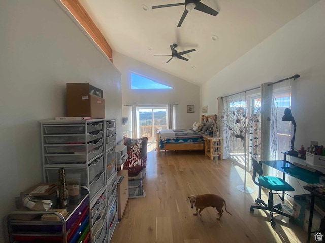 45450 W Cedar Rock Rd, Fruitland, UT 84027 - bedroom with light wood finished floors, ceiling fan, access to exterior, and high vaulted ceiling