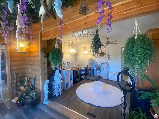 45450 W Cedar Rock Rd, Fruitland, UT 84027 - interior space featuring a ceiling fan, visible vents, log walls, and wood finished floors