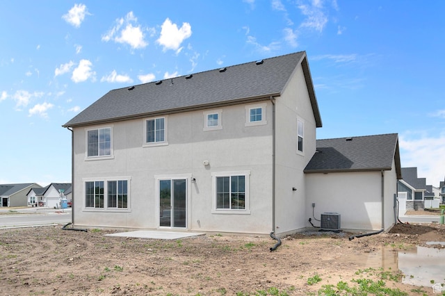 1972 S 2475 W, West Haven, UT 84401 - back of house with a patio area, central air condition unit, stucco siding, and a shingled roof