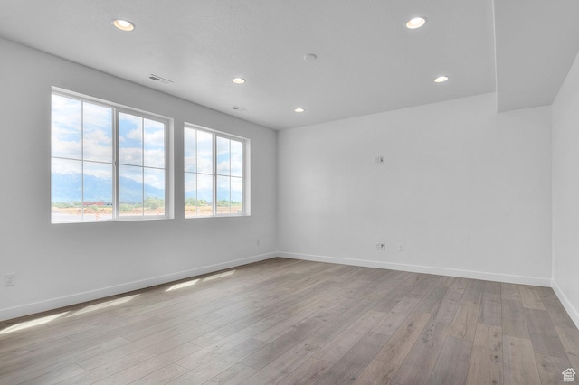 1972 S 2475 W, West Haven, UT 84401 - unfurnished room with recessed lighting, light wood finished floors, and baseboards