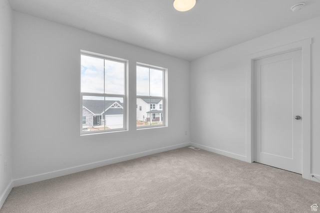 1972 S 2475 W, West Haven, UT 84401 - carpeted spare room with baseboards