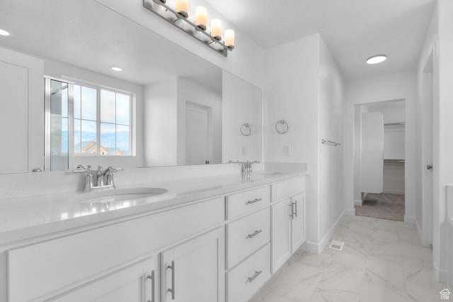 1972 S 2475 W, West Haven, UT 84401 - full bath featuring marble look tile flooring, baseboards, double vanity, recessed lighting, and a spacious closet