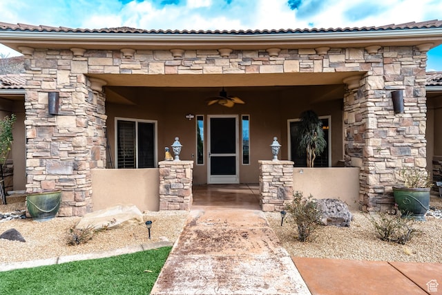 865 Seminole Way S, Washington, UT 84780 - property entrance with stucco siding, a tiled roof, stone siding, and ceiling fan