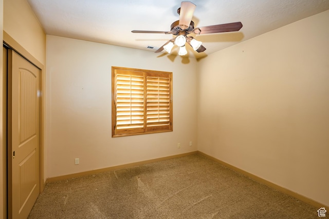865 Seminole Way S, Washington, UT 84780 - carpeted spare room with visible vents, baseboards, and a ceiling fan