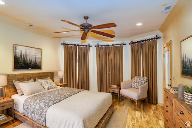 865 Seminole Way S, Washington, UT 84780 - bedroom with light wood-style floors, ceiling fan, and visible vents