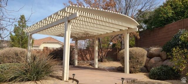 865 Seminole Way S, Washington, UT 84780 - view of patio / terrace featuring a pergola and fence