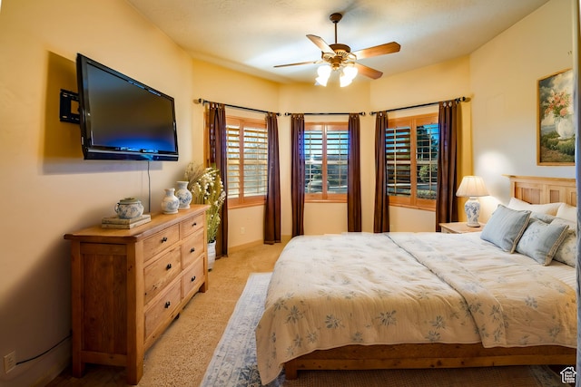 865 Seminole Way S, Washington, UT 84780 - bedroom with light carpet, baseboards, and ceiling fan