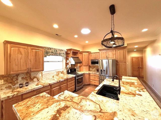 865 Seminole Way S, Washington, UT 84780 - kitchen with light stone countertops, open shelves, a sink, stainless steel appliances, and backsplash