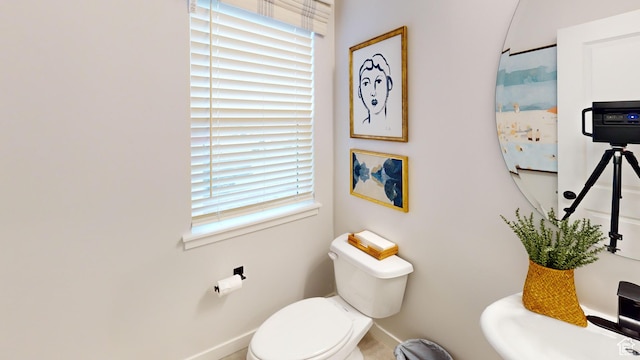 bathroom featuring toilet