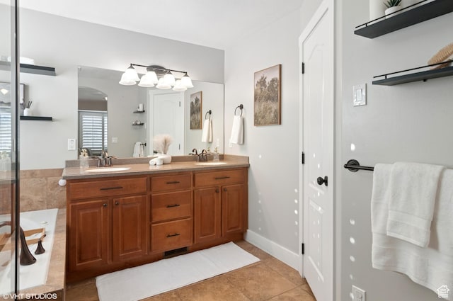 672 W 1900 S, Syracuse, UT 84075 - full bathroom with double vanity, tile patterned floors, a bath, and a sink