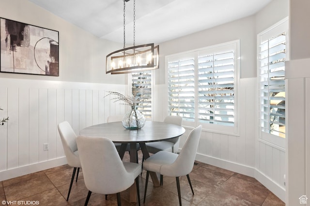 672 W 1900 S, Syracuse, UT 84075 - dining area featuring a wainscoted wall