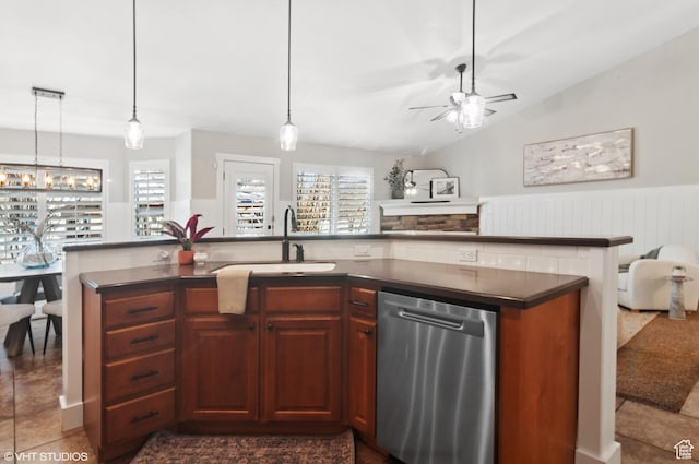 672 W 1900 S, Syracuse, UT 84075 - kitchen featuring a sink, plenty of natural light, dark countertops, open floor plan, and dishwasher