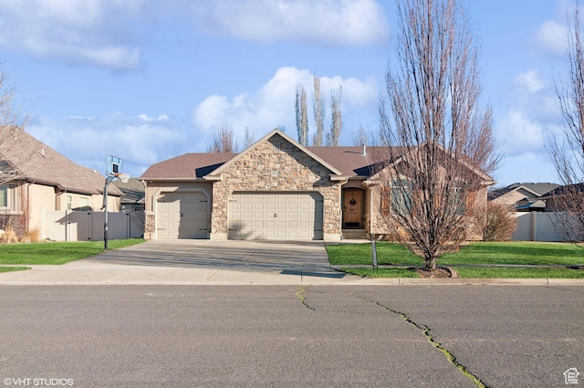 672 W 1900 S, Syracuse, UT 84075 - view of front facade featuring fence, an attached garage, concrete driveway, a front lawn, and stone siding