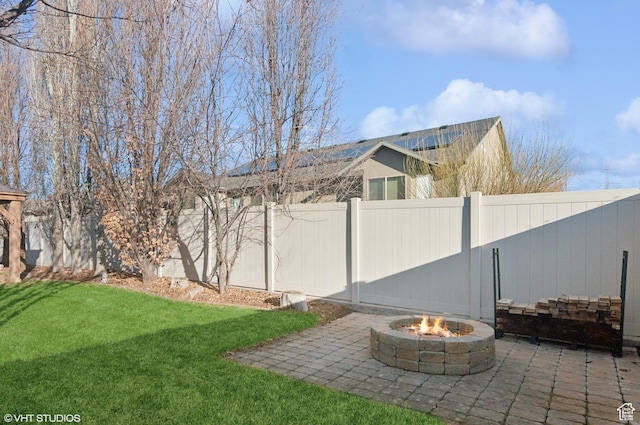 672 W 1900 S, Syracuse, UT 84075 - view of yard featuring a patio area, a fenced backyard, and a fire pit